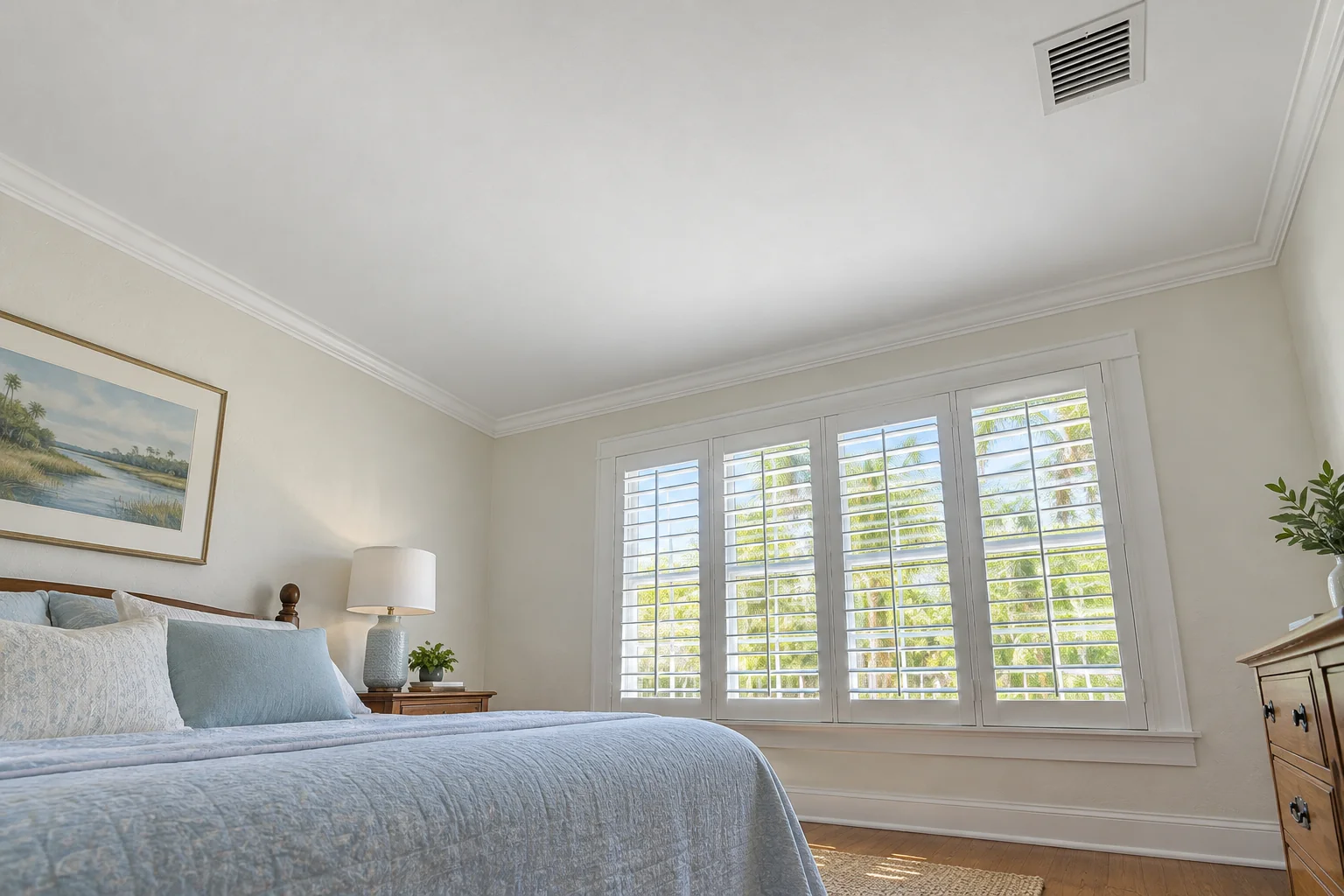 Clean painted bedroom ceiling.